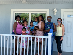 Local Family Receives Home with Help from MaintenX International