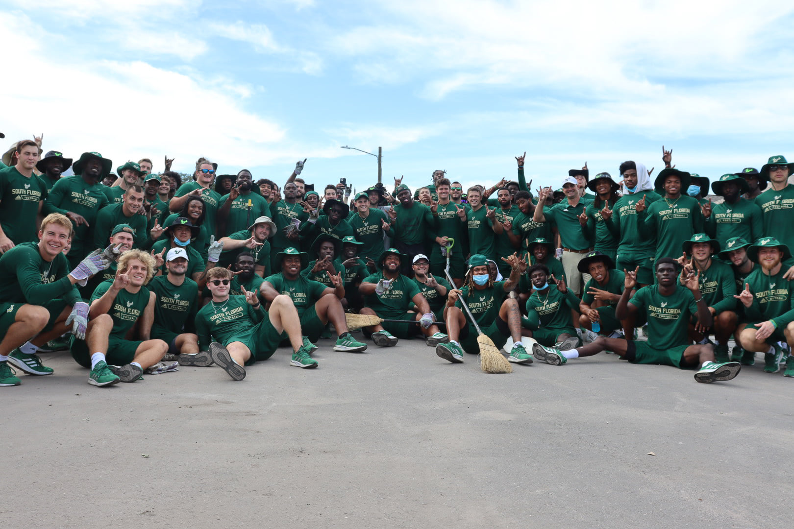 USF Football and Men’s Basketball Teams give back with Habitat for Humanity